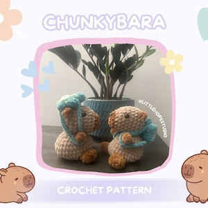 May include: Two crocheted capybara figures, one with a blue hat and the other with a blue backpack, sit in front of a plant. The image includes the text "CHUNKYBARA" and "CROCHET PATTERN".