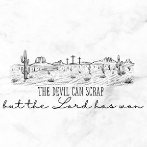 May include: Black and white illustration of a desert landscape with cacti, mountains, and three crosses under a cloudy sky. The text reads "THE DEVIL CAN SCRAP but the Lord has won."