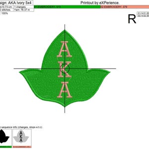 May include: A green leaf with a pink "AKA" embroidered on it. The design is 12.59 cm by 10.73 cm and has 16,500 stitches.