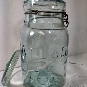 Atlas E-Z Seal Blue/Aqua Glass Quart Canning Jar, Glass Lid, Wire Bale Bubbles Unique patina on this piece  see pictures