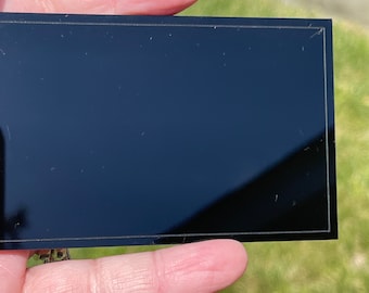 Miniature 1:12 scale flat screen tv black acrylic laser cut, comes with protective paper so it doesn't scratch in transit