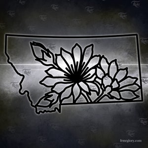 May include: A black and white line art illustration of the state of Montana with two stylized flowers inside the outline of the state.