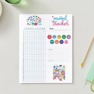 Könnte beinhalten: Ein druckbarer Stimmungs-Tracker mit einem Raster zum Verfolgen der Stimmung über das ganze Jahr. Der Tracker verfügt über ein farbenfrohes Design mit dem Text "It's okay to feel all the feels" und "mood tracker". Es gibt auch mehrere bunte Emojis, die verschiedene Emotionen darstellen.