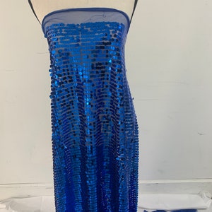 3 yards cut Royal Sequins fabric.