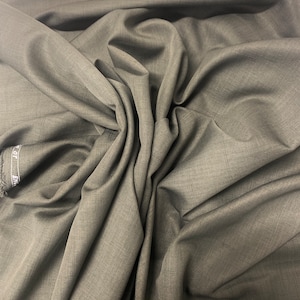Suiting fabric. Color Sage design 18549E 100% polyester width 58/60 inches. free sample available.