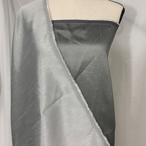 silver grey  shimmer shantung fabric, width 58&quot;. Is a double sided fabric with slub, shimmery and dull sides dry clean fabric. Free sample.