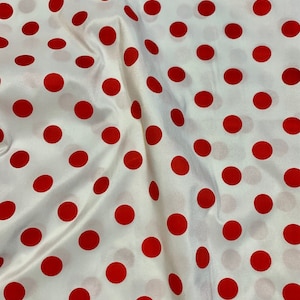 A 2 yards Red Polk dot fabric. dot size is 3/4 inches in diameter. Sold by 2 yards cut continuous.