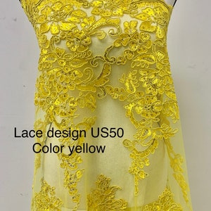 A 2 yard Yellow color Lace Design US50. Double scalloped sequence embroidered width 49/50 inches. condition New.