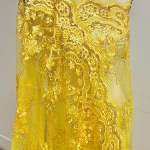 A 2 yards cut Lace color Yellow. Double scalloped sequence embroidered width 49/50 inches. condition. sell by 2 yards cut continues. KMS2