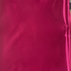 Fucshia color Satin Fabric by yard. color fuchsia width 59 inches.