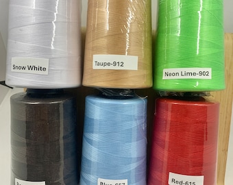 May include: Six spools of thread in various colors, including white, brown, blue, and red. Each spool is labeled with its color name and a number. The colors are Snow White, Taupe-912, Neon Lime-902, Brown-698, Blue-657, and Red-615.
