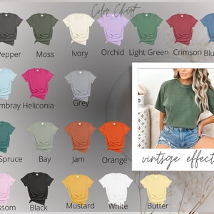 May include: Color chart showing 15 different t-shirt colors. The colors are: Pepper, Moss, Ivory, Orchid, Light Green, Crimson, Blue Jeans, Chambray, Heliconia, Grey, Blue Spruce, Bay, Jam, Orange, Blossom, Black, Mustard, White, and Butter.