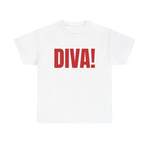 May include: White t-shirt with the word "DIVA!" printed in bold, red letters. The shirt has a crew neck and short sleeves. The text is centered on the front of the shirt.