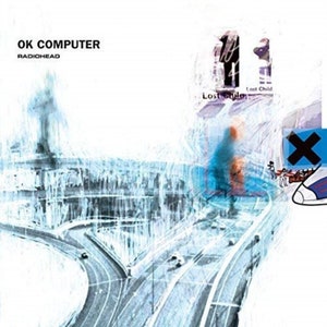 May include: Album cover art for the album "OK Computer" by Radiohead. The cover features a blue and white abstract image of a highway overpass with a blue and white shoe in the upper right corner. The text "OK Computer" and "Radiohead" are in black text at the top of the image.