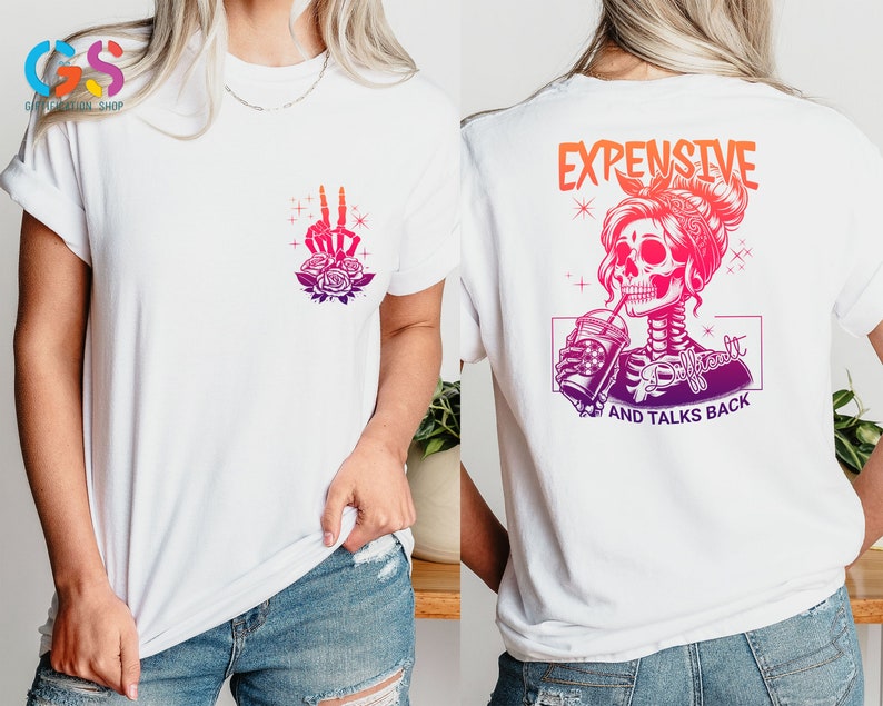 May include: White t-shirt with a pink and purple skull graphic and the text "Expensive and Talks Back".