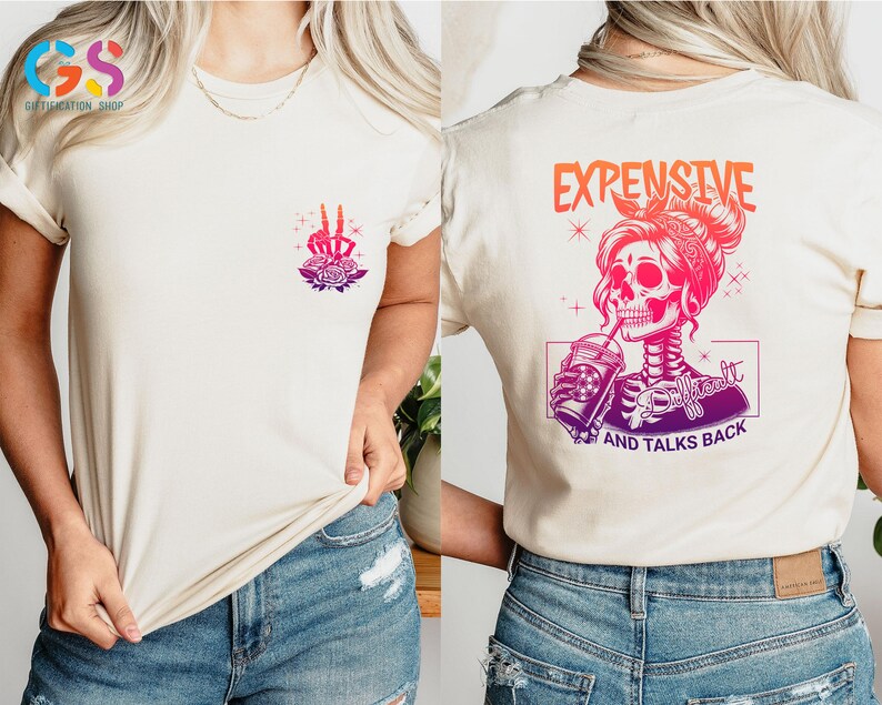 May include: White t-shirt with a pink and purple skeleton graphic holding a drink and the text "Expensive and Talks Back".