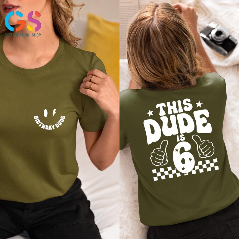 May include: Green t-shirt with a white smiley face graphic that says "Birthday Dude" on the front and "This Dude Is 6" with a thumbs up graphic on the back.