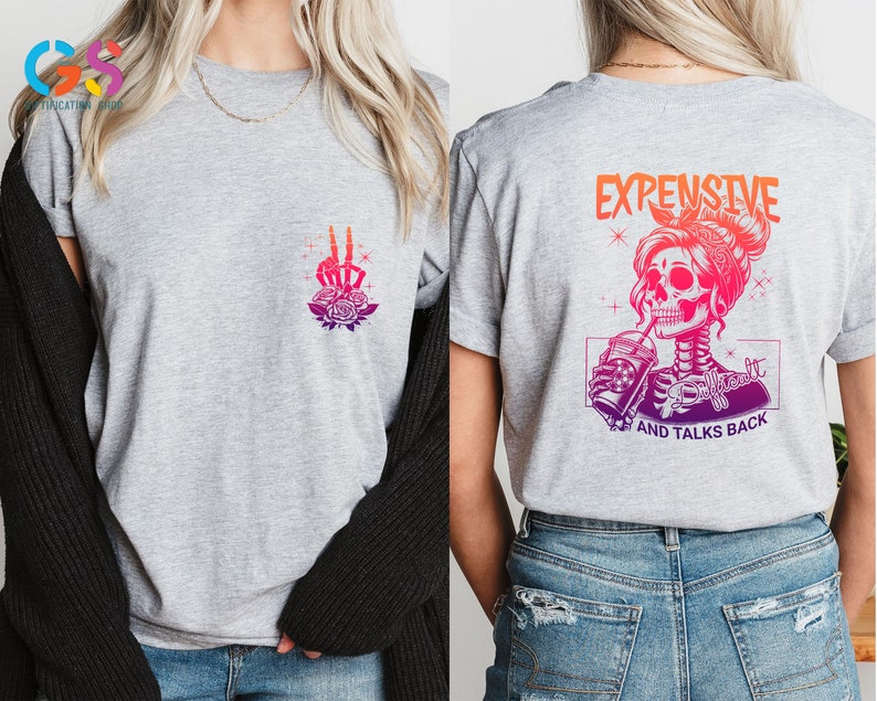 May include: Gray t-shirt with a skeleton graphic on the front and a skeleton graphic with the text "Expensive, Difficult and Talks Back" on the back.