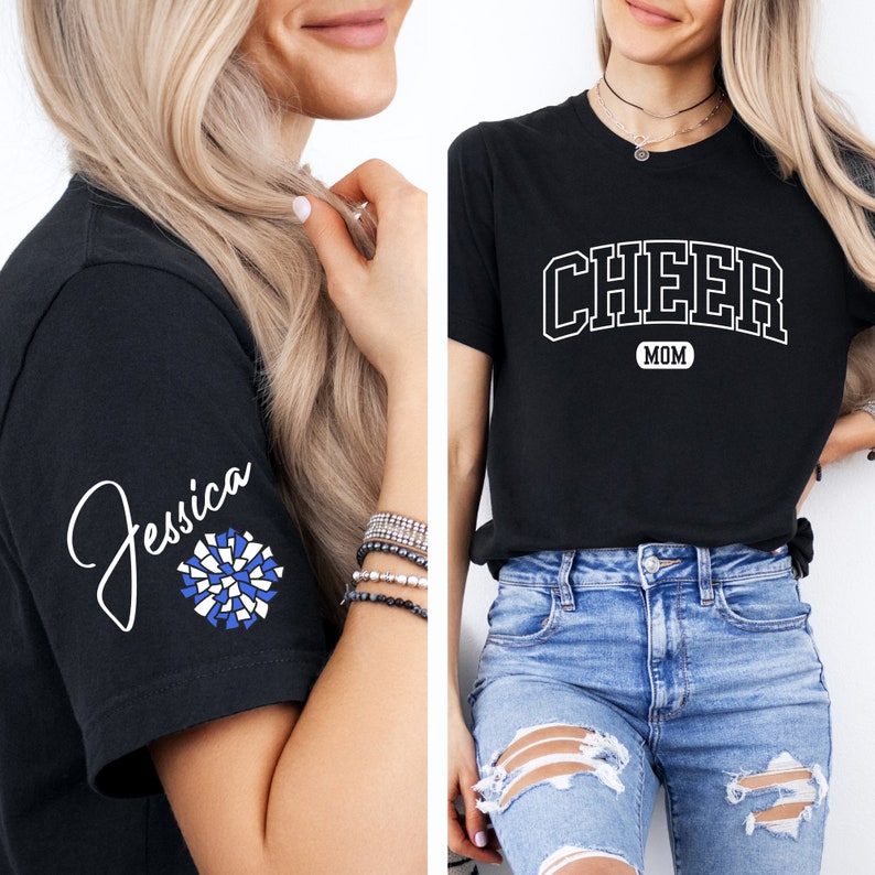 May include: Black t-shirt with white text that says "CHEER MOM" and a white pom-pom graphic on the sleeve. The text "Jessica" is written in cursive on the sleeve.