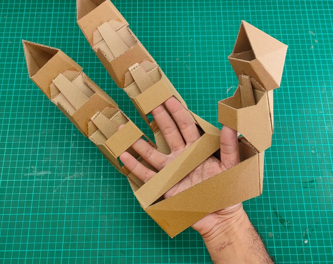 Articulated big mechanical gauntlet cardbard craft template DIY plan