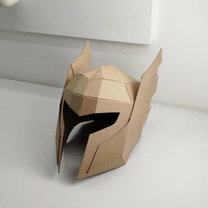 Helmet with wing for Elf or Thor Cosplay On the Table