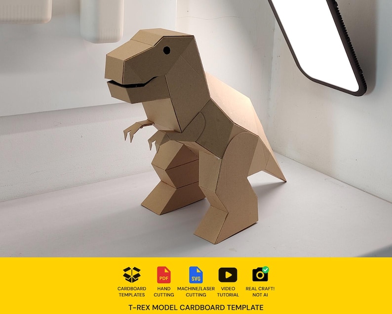 May include: A three-dimensional T-Rex model constructed from brown cardboard with geometric panels. Below the model, a yellow banner displays icons for cardboard templates, PDF, SVG, video tutorial, and real craft, with the text T-REX MODEL CARDBOARD TEMPLATE.