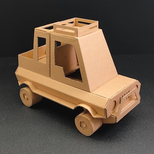 Cardboard Car Toy Template. DIY Printable Pattern for creating Cartoonish jeep from corrugated cardboard. Can be used for desk organizer.