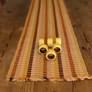 Yellow, Orange & Brown Woven Table runner with 6 Yellow Napkin Rings