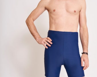 May include: A navy blue swimsuit with a high waist and a short leg length.