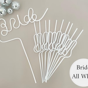 May include: White plastic straws, some with a looped design, and one that spells "Bride". The straws are arranged on a light gray surface, with three small disco ball ornaments in the upper left corner. A white circle with the words "Bride All White" is in the lower right.