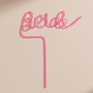 Bright pink reusable party straws for beach bachelorette cups and bridal shower drinks