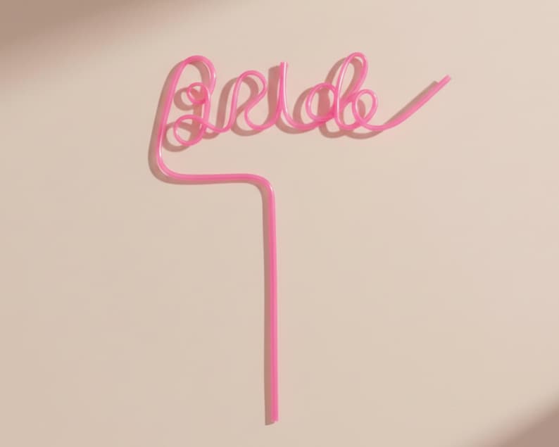 Bright pink reusable party straws for beach bachelorette cups and bridal shower drinks