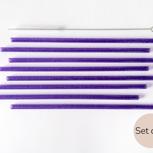 May include: Set of eight purple reusable drinking straws with a silver cleaning brush.  Set of 8.
