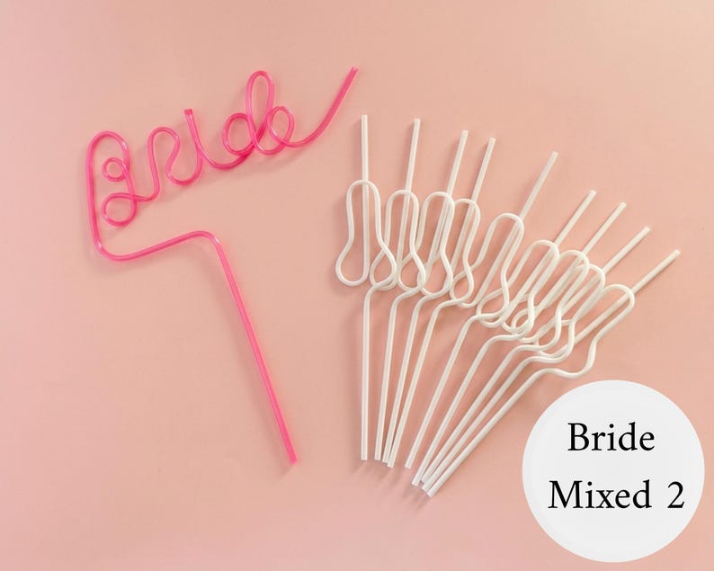 May include: Pink plastic straw with the word "Bride" in a cursive font, and a set of white decorative straws. The straws are on a light pink background. A white circle with the words "Bride Mixed 2" is in the bottom right corner.