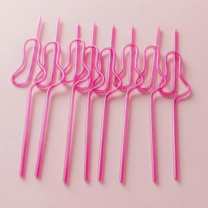 Fun hot pink drink straw set for bachelorette weekend, girls trip, and wedding party favors