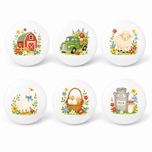 May include: Six white ceramic cabinet knobs with farm-themed illustrations. Designs include a red barn, a green truck, a sheep, a duck, a basket of eggs, and a milk jug, all surrounded by colorful flowers.