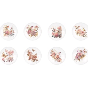 May include: Set of eight white ceramic coasters with floral and bird designs. Each coaster features a different arrangement of pink roses, butterflies, and small birds.