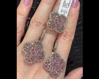 May include: A set of pink and white diamond earrings and a ring. The earrings and ring are shaped like a four-leaf clover. The jewelry is made of silver and has a total weight of 16.000 grams. The diamonds weigh 1.60ct and the pink stones weigh 3.71ct.