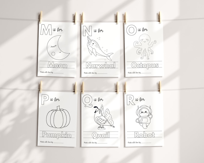 May include: Six black and white printable alphabet flashcards with a letter, an illustration, and the word for the illustration. The letters are M, N, O, P, Q, and R. The illustrations are a moon, a narwhal, an octopus, a pumpkin, a quail, and a robot.