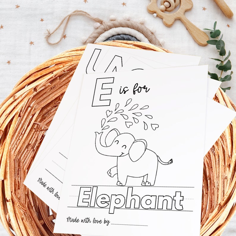 May include: Black and white printable alphabet flashcard featuring the letter E and an illustration of an elephant. The text "E is for Elephant" is written below the image. The card is designed for children to learn the alphabet and practice writing.