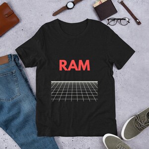 May include: Black t-shirt with a red "RAM" graphic and a white grid pattern underneath.