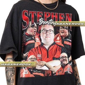 May include: Black t-shirt with a graphic print of four men in red and white dart player uniforms. The text "STEPHEN Bunting HABANEROCK" is printed on the shirt.