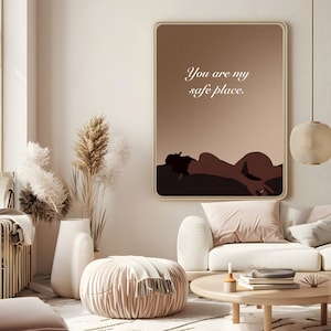 May include: A digital art print with a brown background and a silhouette of a person lying down. The text "You are my safe place." is written in white on the print.