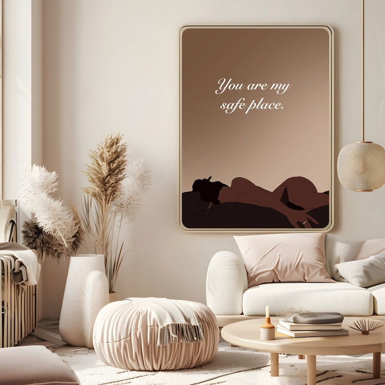May include: A digital art print with a brown background and a silhouette of a person lying down. The text "You are my safe place." is written in white on the print.