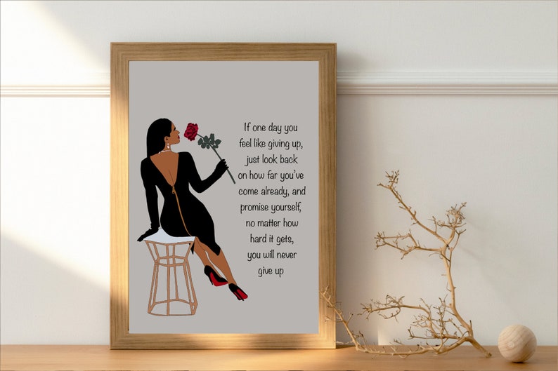 May include: A motivational quote about perseverance and self-belief, illustrated with a black silhouette of a woman in a black dress holding a red rose. The quote reads: "If one day you feel like giving up, just look back on how far you've come already, and promise yourself, no matter how hard it gets, you will never give up."