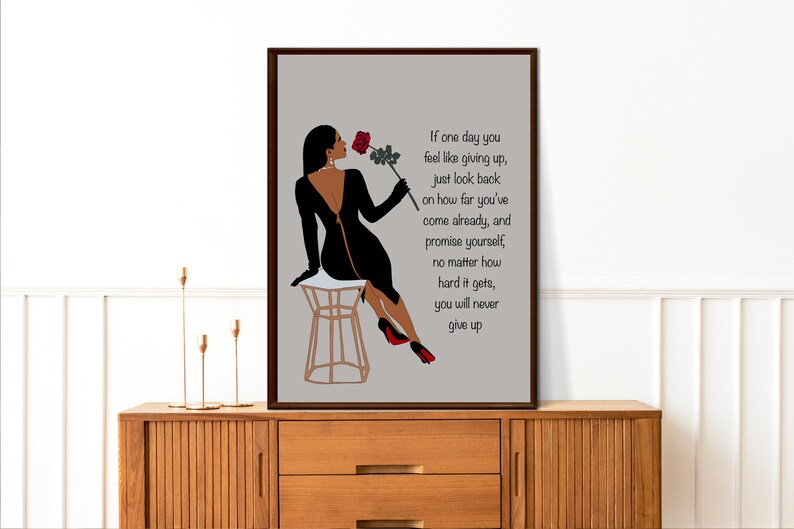 May include: A motivational quote about perseverance and never giving up, illustrated with a woman in a black dress sitting on a stool, holding a red rose. The quote reads: "If one day you feel like giving up, just look back on how far you've come already, and promise yourself, no matter how hard it gets, you will never give up."