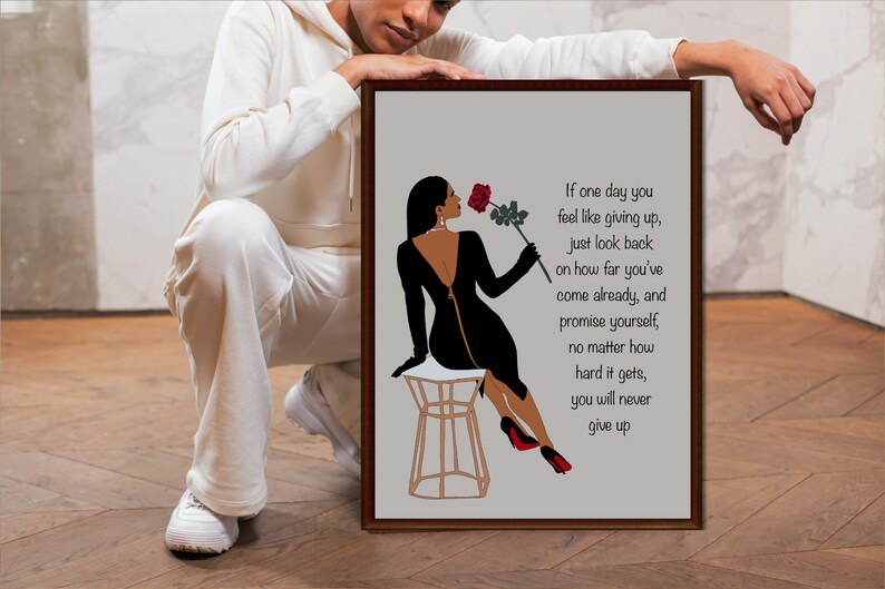 May include: A motivational quote about perseverance and never giving up, illustrated with a black silhouette of a woman in a black dress holding a red rose. The quote reads: "If one day you feel like giving up, just look back on how far you've come already, and promise yourself, no matter how hard it gets, you will never give up."