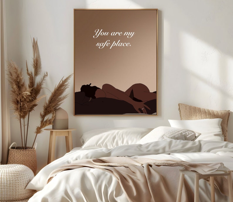 May include: A digital art print with a brown background and a silhouette of a person lying down. The text "You are my safe place." is written in white on the print.