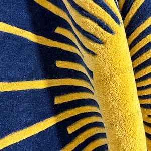 Hand-Tufted Wool Round Rug: Multicolor Sun Design