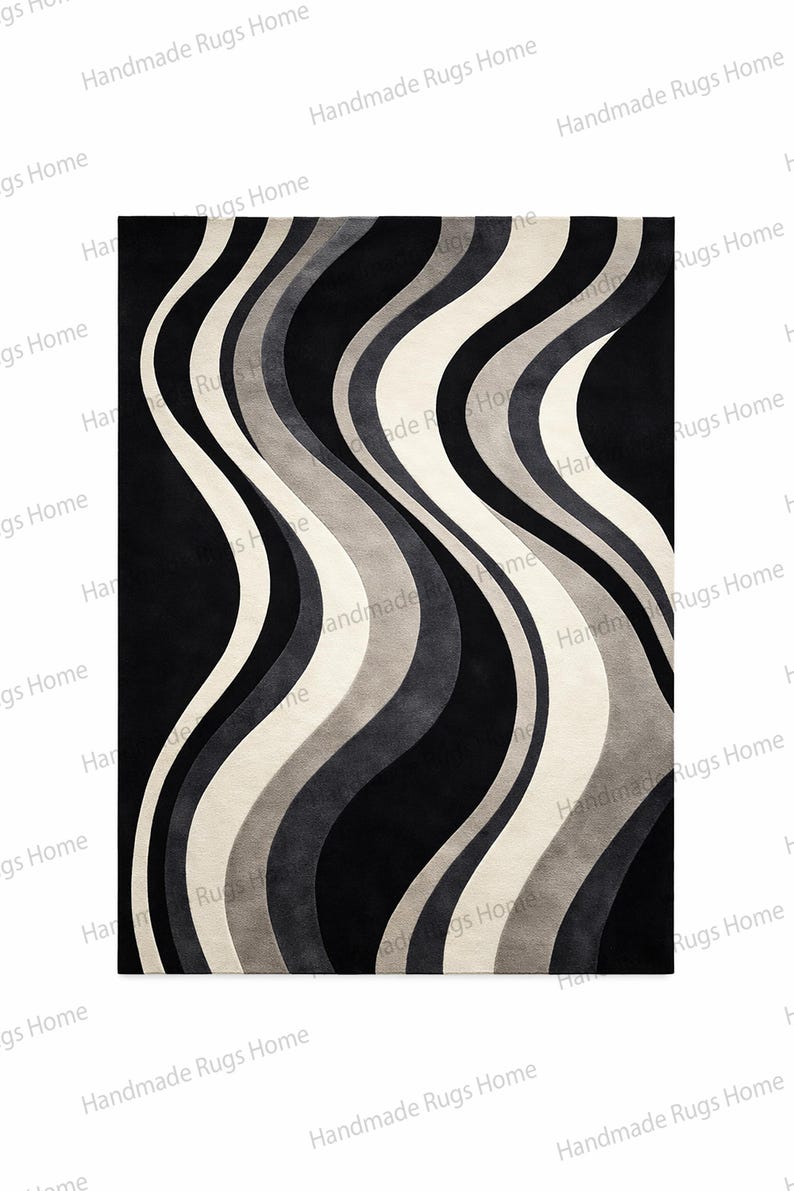 Premium handmade tufted rug with layered tonal design,

Artistic black and cream area rug beneath emerald sofa,

Sophisticated living room with bold statement carpet,

High density wool rug with smooth curved pattern,

Charcoal gray ivory floor covering in upscale home